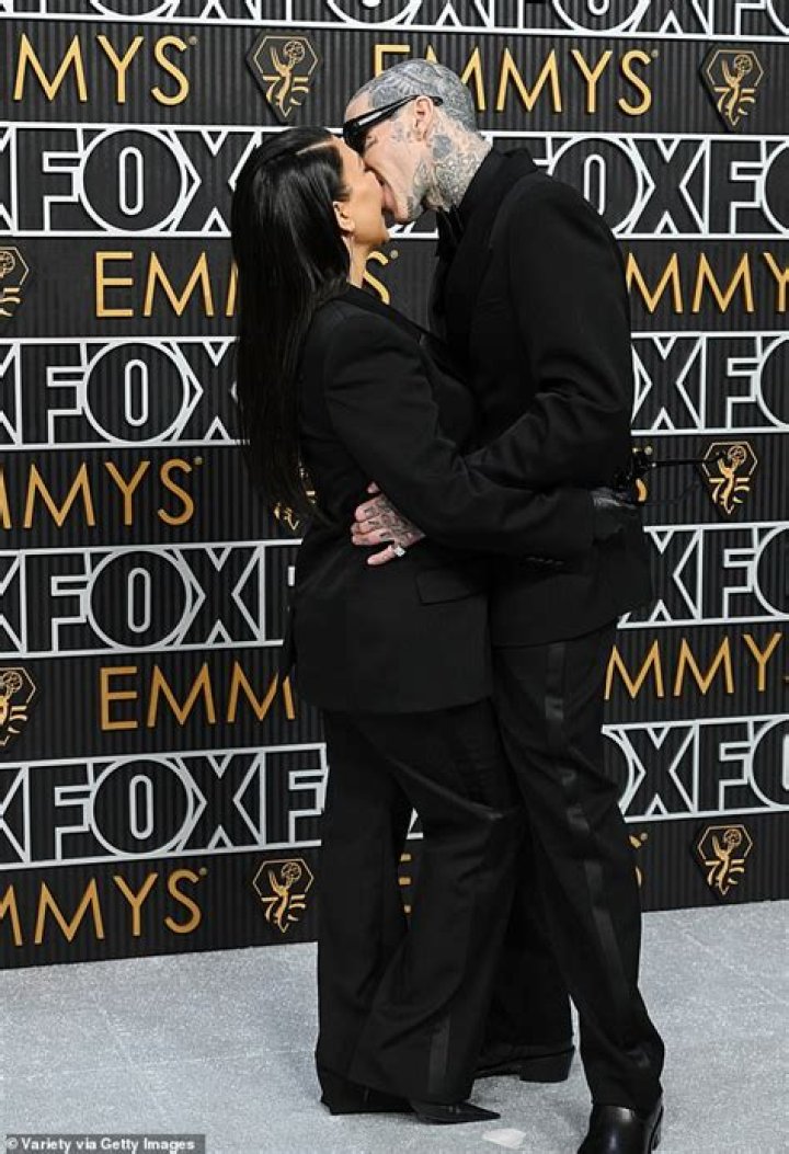 Kourtney Kardashian & Travis Barker Passionately Kiss In First Photos Since Engagement